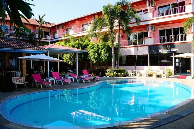 The pool terrace at Maggie May's, with the gents club entrance behind it